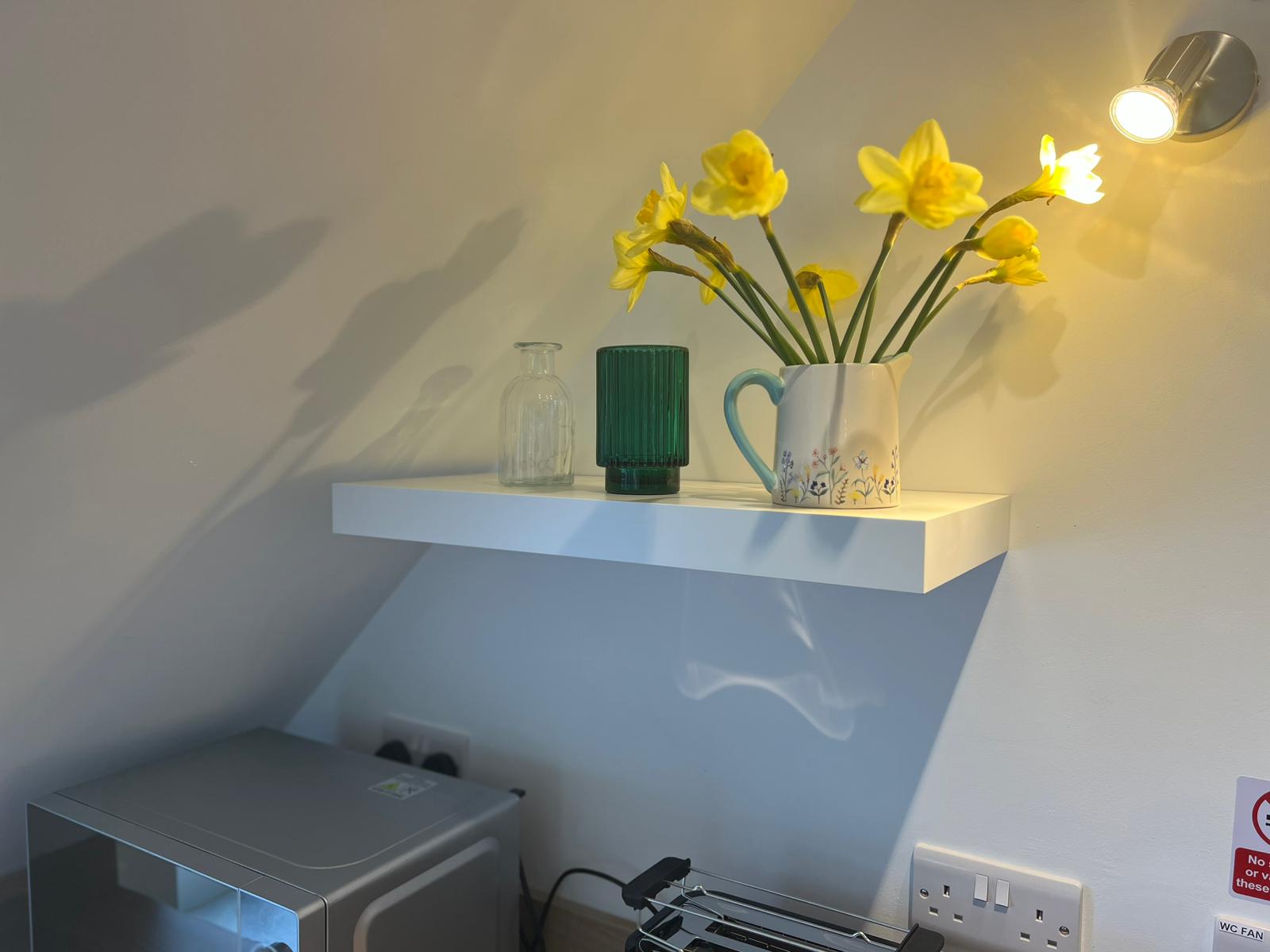 Kitchen detail with fresh flowers